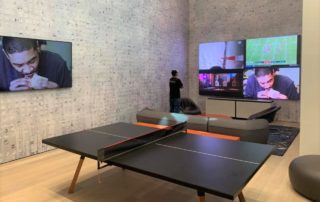 Fine tuning video wall edited Residential smart TV video wall with ping pong table